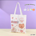 กระเป๋าผ้าพิมพ์ลาย 33x36 cm : หูยาว 22 cm คละลาย +พวงกุญแจน่ารัก
